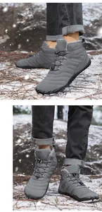Close-up of grey waterproof snow boot featuring warm faux fur lining and anti-slip sole