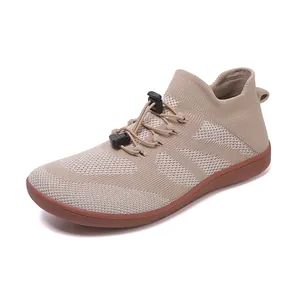 Khaki breathable fly-knit sock shoes with elastic toggles and non-slip rubber soles