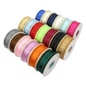 Rolls of 4cm gold-edged organza and satin ribbons in assorted colors for DIY floral decor