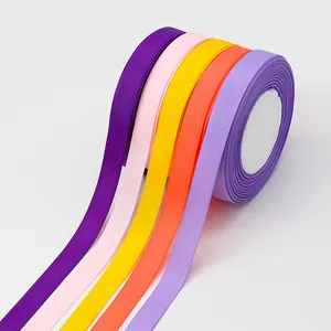 Five rolls of colorful grosgrain ribbon for DIY crafts and gift wrapping sets