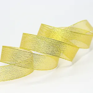 Glittery gold metallic ribbon roll for luxury gift wrapping and DIY crafts decoration