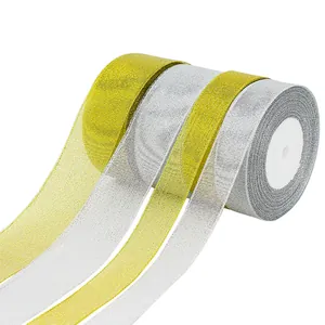 Glittering gold and silver metallic ribbons for gift wrapping and cake packaging boxes