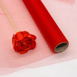 Red organza tulle fabric roll for DIY rose making and wedding floral decorations