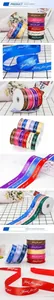 Detail of Just for you printed satin ribbon rolls in various colors for gift wrapping