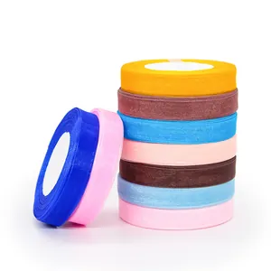 Rolls of 1.5cm transparent organza ribbon in vibrant colors for gift wrapping
