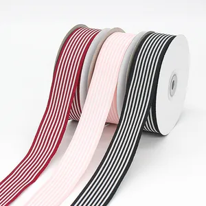 2.5cm striped grosgrain ribbons in red, pink, and black rolls for gift wrapping