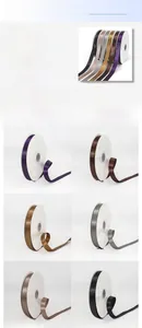 Detail showing 2cm double-sided polyester ribbon spools in six classic assorted colors