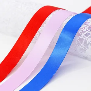 Red, pink and royal blue double-sided satin ribbons for gift wrapping and DIY crafts