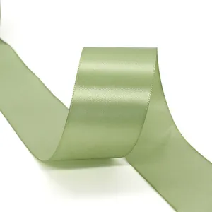Elegant sage green satin ribbon with smooth silk texture on white background