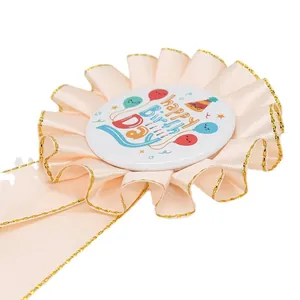 Pink satin birthday award ribbon with Happy Birthday badge and gold trim details