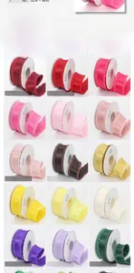 Multiple spools of 4cm lychee textured polyester ruffled ribbons in various pink tones