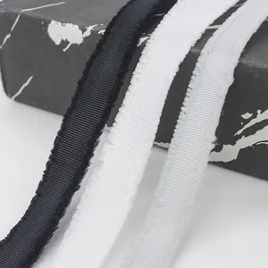 Frayed edge ribbed ribbon in black and white for gift wrapping and DIY crafts