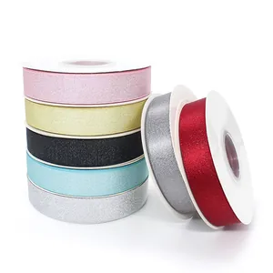 Rolls of 2cm metallic glitter ribbons in assorted colors for festive gift packaging