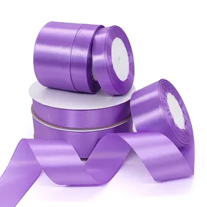 Lavender purple satin ribbon rolls in various widths for gift wrapping and floral decor