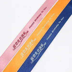 Satin Happy Birthday ribbons in pink, orange and blue for gift packaging decoration