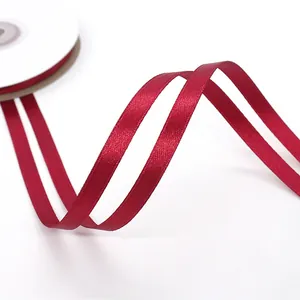 Deep red 6mm double-sided satin ribbon roll with silk finish for gift wrapping