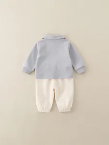 Minimalist grey long sleeve top and beige trousers set for toddlers in soft cotton fabric