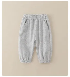 Detail of toddler heather grey joggers with elastic waistband and ribbed cuffs