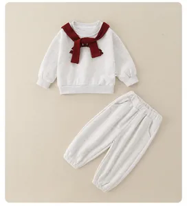 Toddler casual grey knit sweatshirt and jogger pants set with a dark red decorative shawl