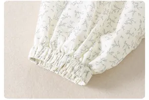 Detail of elastic cuffs on a floral toddler girl jacket with delicate print
