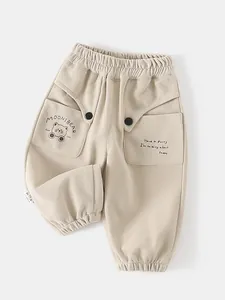 Pantalon de jogging enfant beige avec imprimé ours mignon et taille élastique confortable