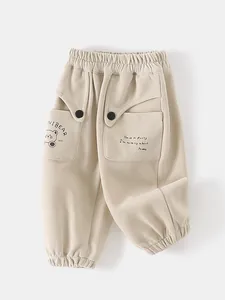 Pantalon de jogging enfant beige avec poches ours de dessin animé et taille élastique