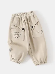 Pantalon de jogging ample pour enfants avec motif ours mignon et poches en beige