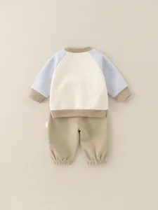 Ensemble mignon deux pièces en coton pour bébé avec motif chiot et pantalon