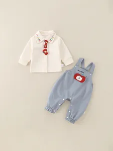 Ensemble printemps enfant avec polo beige et salopette bleue à motif de dessin animé