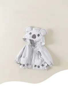 Close-up of cute koala ears on a light grey hooded jacket for young boys
