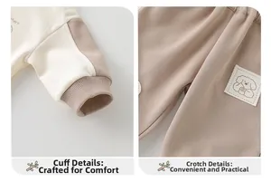 Detail of ribbed cuffs and dog patch embroidery on soft cotton baby set