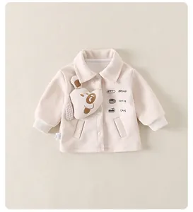 Detailed view of kids cartoon puppy fleece jacket with snap buttons and rib knit cuffs