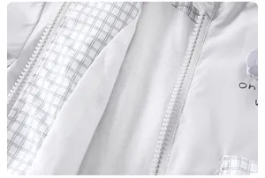Detail of toddler windbreaker featuring white fleece lining and smooth resin zipper