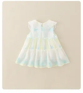 Detail of baby girl sleeveless dress with white lace collar and blue watercolor pattern