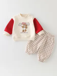 Toddler boys casual cotton spring outfit with red raglan sleeves and checkered pants