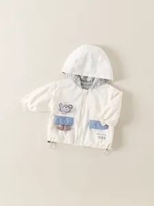 Kids off-white hooded windbreaker with blue pockets and cute bear patch detail