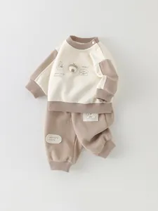 Baby boy two-piece cotton tracksuit with cartoon puppy print in cream and mocha colors