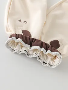 Pantalon beige en coton pour garçons avec oreilles d'animaux et broderie OK mignonne