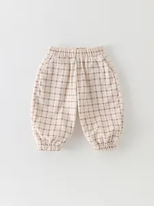 Boys beige plaid cotton jogger pants with elastic waist and side pockets for spring