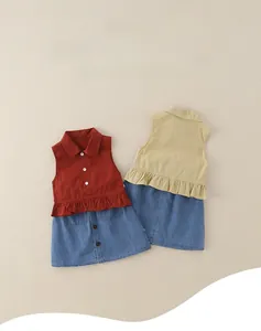 Detail view of sleeveless ruffled top and denim skirt set for girls with functional pockets