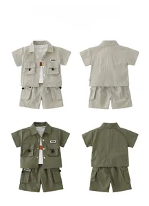 Flat lay of khaki and army green kids cargo shirt and shorts set with utility pockets
