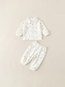Kids corduroy set with colorful geometric patterns including collared shirt and pants