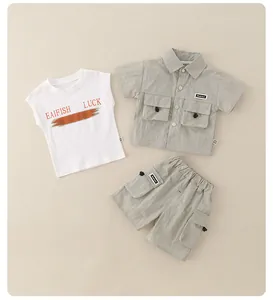 Detailed flat lay of boys three-piece summer set with green shirt and cargo shorts