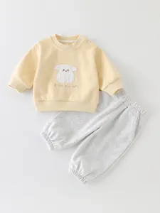 Katoenen peutertrainingspak met geel geborduurde sweater en grijze joggingbroek
