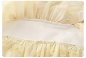 Detailed macro view of girls floral chiffon set with precise stitching and elastic waist
