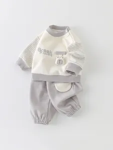 Cute baby boy two-piece cotton set with sweatshirt and pants featuring bear embroidery