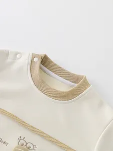 Baby-Sweatshirt in Creme mit Schulterknöpfen und niedlicher Cartoon-Stickerei für Jungen