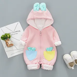 Pink waffle knit baby hooded romper with cute polka dot bunny ears and contrast pockets