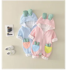 Detail of baby hooded rompers with cute rabbit ears and waffle texture fabric