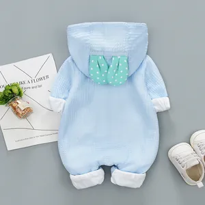 Light blue waffle knit baby romper with cute bunny ears on hood for spring warmth
